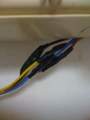 electric cable joined and insulated using electrical tape.